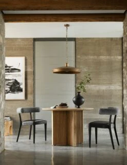 Sekani Round Dining Table 11 Sekani Round Dining Table -Lulu and Georgia Store 232540 001 ROM 1